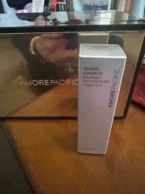 Amore Pacific Treatment Cleansing Oil in Silver & Gold Packaging